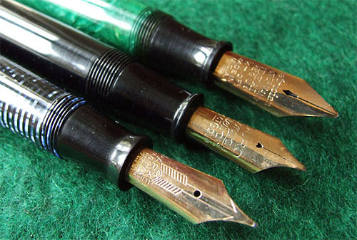 image of three pens